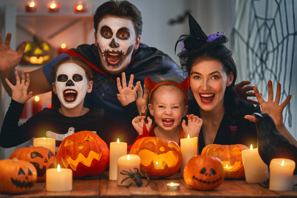 A family in Halloween Costumes